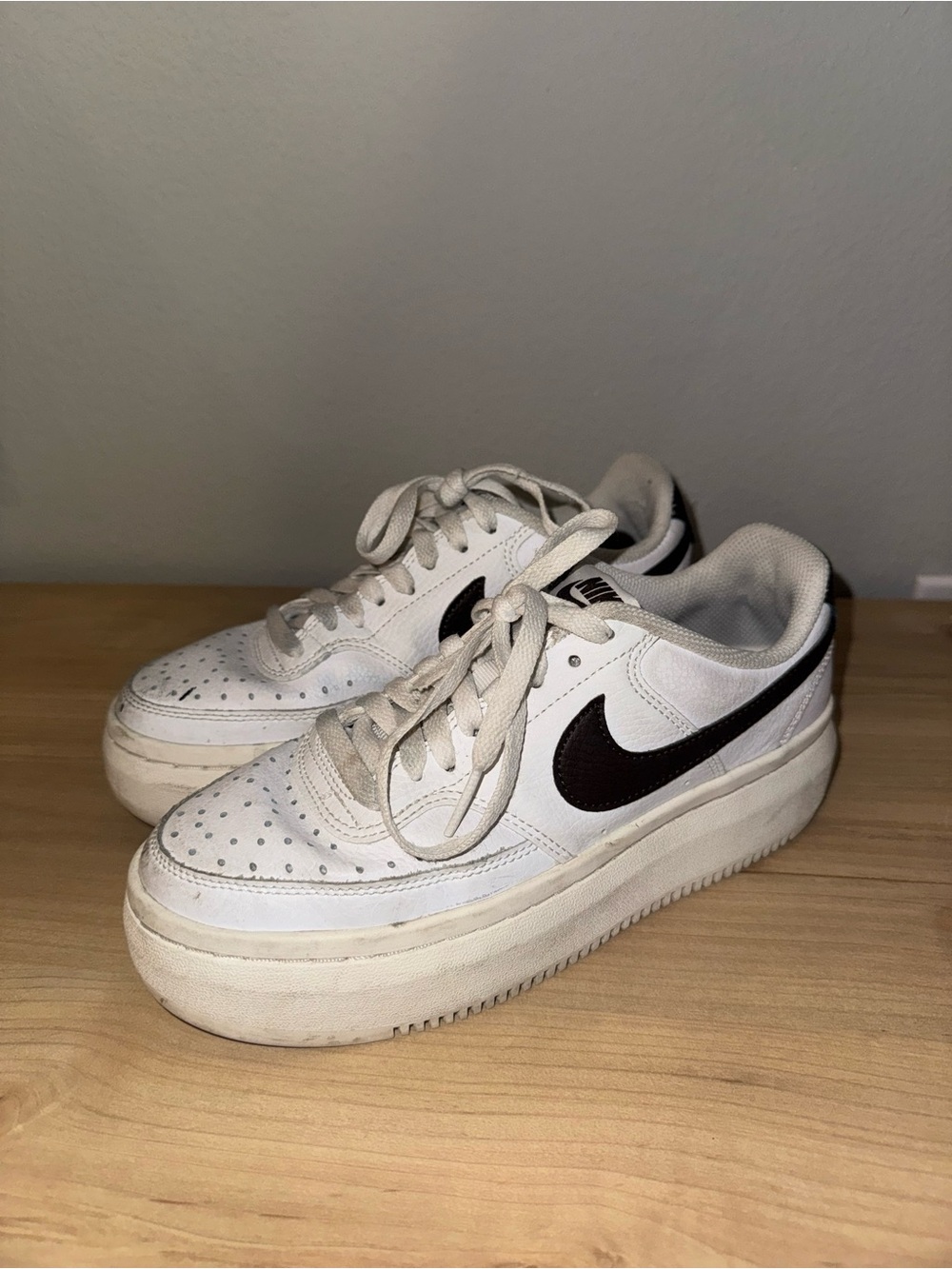 Nike White Platform Sneakers with brown Swoosh